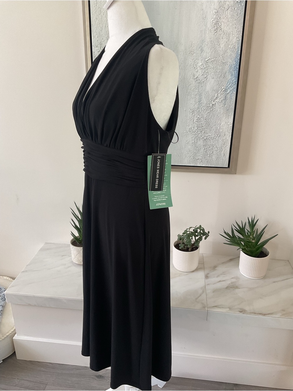 **JONES WEAR DRESS** Gorgeous Black  “Day  to Dinner” with plunging neckline.